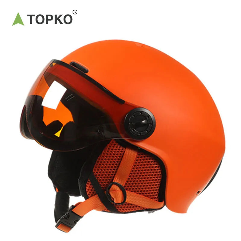 Snowboarding helmet with a visor