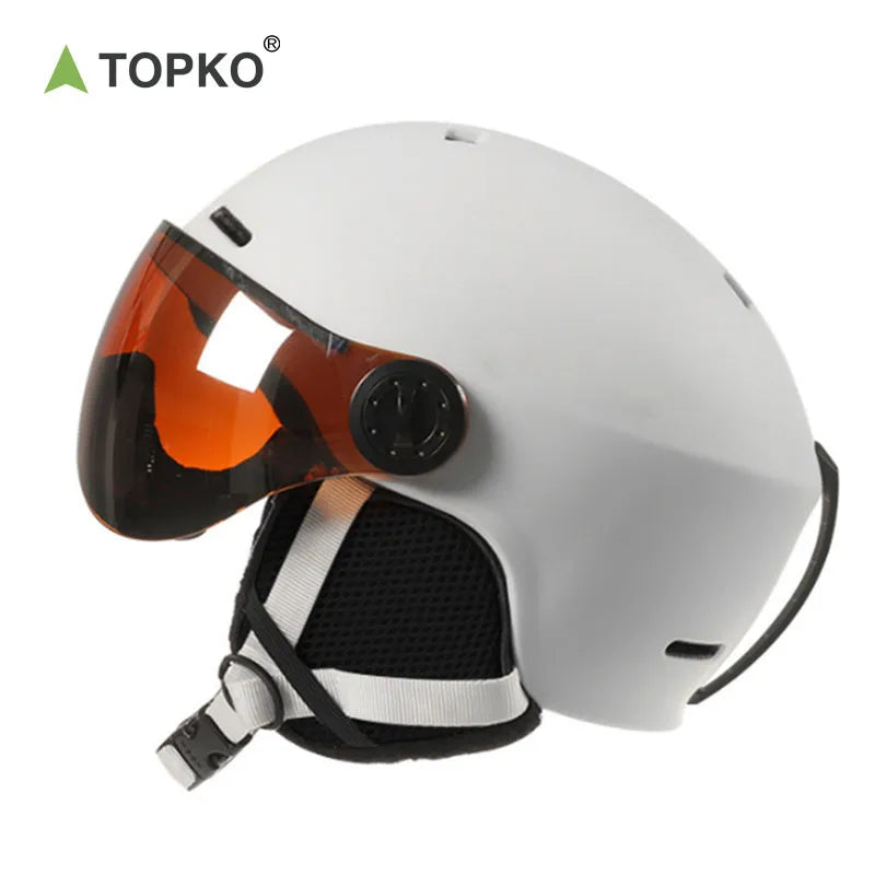 Snowboarding helmet with a visor